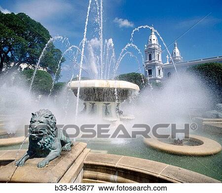 Stock Photo - Puerto Rico. Ponce. Degetau Plaza: fountain and cathedral. Fotosearch