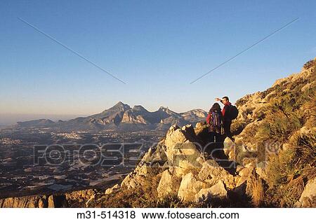 Puig Campana mountain from the Bernia Mountain range, Alicante province. Spain View Large Photo Image Stock Photo - Puig Campana mountain from the Bernia Mountain range, Alicante province. Spain. Fotosearch