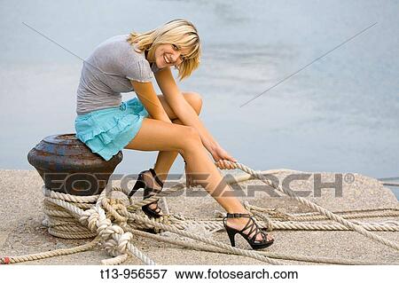 Pulling rope in harbor View Large Photo Image Stock Photo - Pulling rope in harbor. Fotosearch