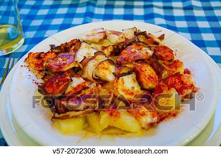 Pulpo a feira serving. Galicia, Spain. View Large Photo Image Stock Photograph - Pulpo a feira serving. Galicia, Spain.. Fotosearch