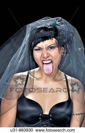 Punk Bride in her late 20s wearing a black dress screaming View Large Photo Image Stock Image - Punk Bride in her late 20s wearing a black dress screaming. Fotosearch