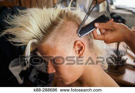 Stock Photograph - Punk getting hair cut. Sweden. Fotosearch