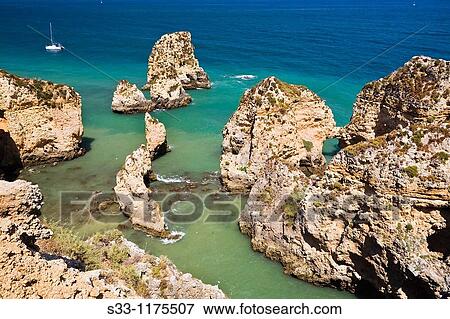 Stock Photo - Punta de Piedade in Lagos The Algarve Portugal. Fotosearch