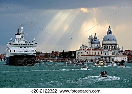 Punta della Dogana, and Santa Maria della Salute church behind, with liner cruise boat and boats, Venice, Italy. View Large Photo Image Stock Image - Punta della Dogana, and Santa Maria della Salute church behind, with liner cruise boat and boats, Venice, Italy.. Fotosearch
