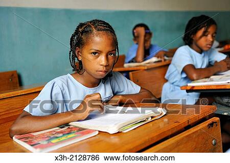 Pupil in class of the primary school in the village of Praia das Conchas, in the northern part of Sao Tome Island, Republic of Sao Tome and Principe, Africa. View Large Photo Image Stock Photograph - Pupil in class of the primary school in the village of Praia das Conchas, in the northern part of Sao Tome Island, Republic of Sao Tome and Principe, Africa.. Fotosearch