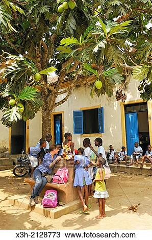 pupils in the playground of the primary school in the village of Praia das Conchas, in the northern part of Sao Tome Island, Republic of Sao Tome and Principe, Africa. View Large Photo Image Stock Image - pupils in the playground of the primary school in the village of Praia das Conchas, in the northern part of Sao Tome Island, Republic of Sao Tome and Principe, Africa.. Fotosearch