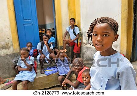 pupils in the playground of the primary school in the village of Praia das Conchas, in the northern part of Sao Tome Island, Republic of Sao Tome and Principe, Africa. View Large Photo Image Stock Photo - pupils in the playground of the primary school in the village of Praia das Conchas, in the northern part of Sao Tome Island, Republic of Sao Tome and Principe, Africa.. Fotosearch