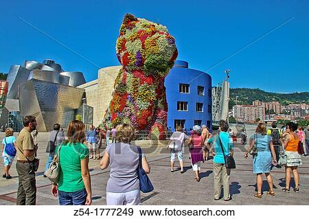 Puppy? statue by Jeff Koons, Guggenheim Museum, Bilbao, Basque Country Spain View Large Photo Image Stock Photo - Puppy? statue by Jeff Koons, Guggenheim Museum, Bilbao, Basque Country Spain. Fotosearch