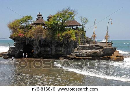 Pura Tanah Lot temple founded by the 15th century priest Danghyang Nirartha, Bali, Indonesia View Large Photo Image Stock Photograph - Pura Tanah Lot temple founded by the 15th century priest Danghyang Nirartha, Bali, Indonesia. Fotosearch