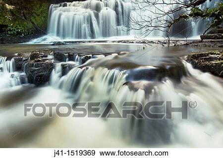 Purakanui Falls, Catlins Forest Park, Otago, South Island, New Zealand View Large Photo Image Stock Photo - Purakanui Falls, Catlins Forest Park, Otago, South Island, New Zealand. Fotosearch