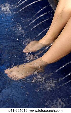 Putting a toe in the water View Large Photo Image Stock Photo - Putting a toe in the water. Fotosearch