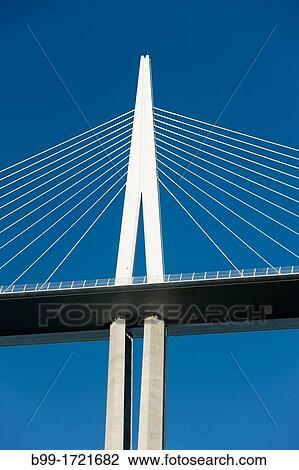 PYLON VIADUCT DE MILLAU AUTOROUTE 75 LA MERIDIEE MASSIF CENTRAL AVEYRON FRANCE View Large Photo Image Stock Image - PYLON VIADUCT DE MILLAU AUTOROUTE 75 LA MERIDIEE MASSIF CENTRAL AVEYRON FRANCE. Fotosearch