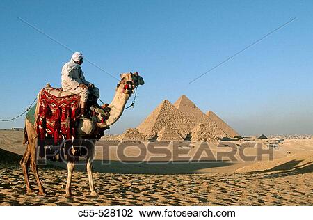 Stock Image - Pyramids of Khufu, Khafre and Menkaure at Giza. Egypt. Fotosearch
