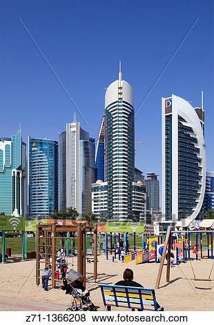 Qatar, Doha, Al Corniche Street, modern architecture, playground, View Large Photo Image Stock Photo - Qatar, Doha, Al Corniche Street, modern architecture, playground,. Fotosearch