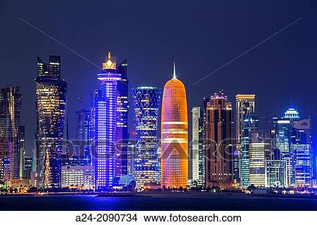 Qatar, Doha City, The Corniche, West Bay Skyline at sunset. View Large Photo Image Picture - Qatar, Doha City, The Corniche, West Bay Skyline at sunset.. Fotosearch