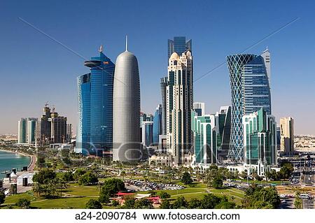 Picture - Qatar, Doha City, The Corniche, West Bay Skyline.. Fotosearch