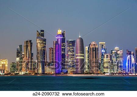 Qatar, Doha City, The Corniche, West Bay Skyline at sunset. View Large Photo Image Stock Image - Qatar, Doha City, The Corniche, West Bay Skyline at sunset.. Fotosearch