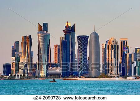 Qatar, Doha City, The Corniche, West Bay Skyline at sunset. View Large Photo Image Stock Photo - Qatar, Doha City, The Corniche, West Bay Skyline at sunset.. Fotosearch