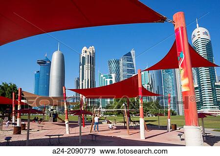 Qatar, Doha City, The Corniche, West Bay Skyline, Children Park. View Large Photo Image Stock Photo - Qatar, Doha City, The Corniche, West Bay Skyline, Children Park.. Fotosearch