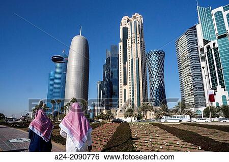 Stock Photograph - Qatar, Doha City, The Corniche, West Bay Skyline.. Fotosearch