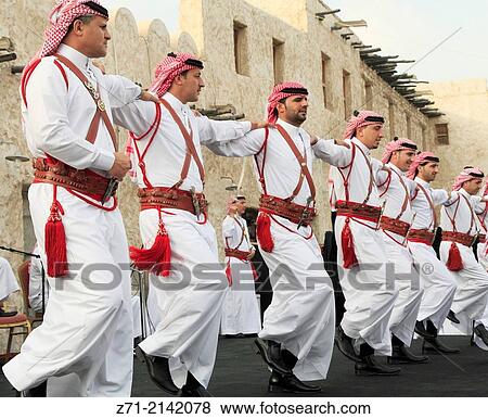 Stock Photo - Qatar, Doha, Souq Waqif, men, dancing,.. Fotosearch