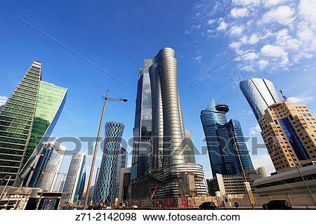 Stock Photo - Qatar, Doha, West Bay, business district, street scene,.. Fotosearch