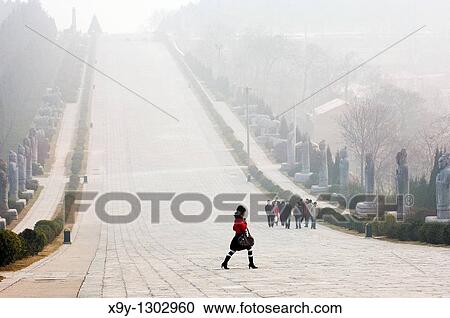 Stock Image - Qianling Mausoleum, Shaanxi Province, China Statue lined spirit path leading from tomb of Tang Dynasty emperor Li Zhi Winter. Fotosearch