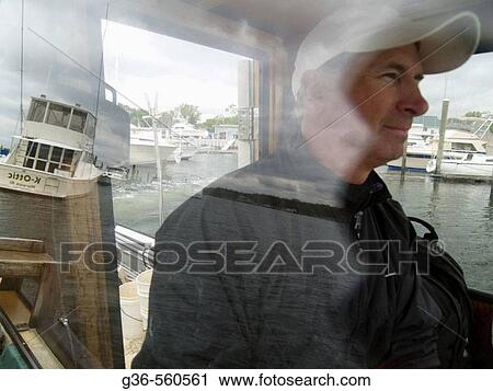 Quahogger John? Jackie? Bannon works on Narragansett Bay, in Rhode Island, USA View Large Photo Image Stock Image - Quahogger John? Jackie? Bannon works on Narragansett Bay, in Rhode Island, USA. Fotosearch