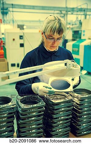 Quality control. Anchor flange particle filter. Machined Indecober. Machining of precision parts in series. Automotive industry. Berriz. Bizkaia. Basque Country. Spain. View Large Photo Image Stock Photograph - Quality control. Anchor flange particle filter. Machined Indecober. Machining of precision parts in series. Automotive industry. Berriz. Bizkaia. Basque Country. Spain.. Fotosearch