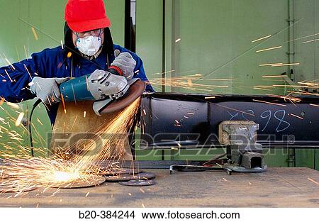 Quality control test of abrasive disk for cutting metal with electronic whetstone. Metal industry. View Large Photo Image Picture - Quality control test of abrasive disk for cutting metal with electronic whetstone. Metal industry.. Fotosearch