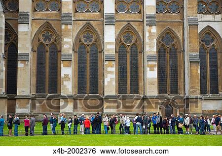 Stock Photograph - Queue outside Westminster Abbey church Parliament square Westminster central London England Britain UK Europe.. Fotosearch
