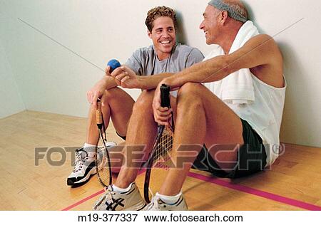 racket ball player relax/chatting between games View Large Photo Image Stock Photo - racket ball player relax/chatting between games. Fotosearch