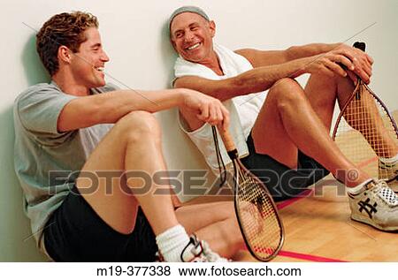 racket ball player relax/chatting between games View Large Photo Image Stock Photo - racket ball player relax/chatting between games. Fotosearch