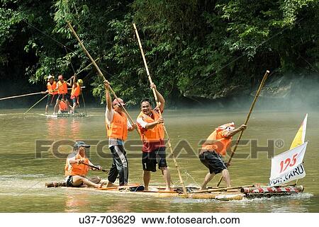 Rafting Competition in action along Padawan River, Sarawak, Malaysia. View Large Photo Image Stock Photo - Rafting Competition in action along Padawan River, Sarawak, Malaysia.. Fotosearch