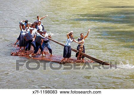 Rai or almadia raft La Pobla de Segur Diada dels Raiers ferrymen feast day Noguera Pallaresa river Pyr? n? es Lleida province Catalonia Spain View Large Photo Image Stock Image - Rai or almadia raft La Pobla de Segur Diada dels Raiers ferrymen feast day Noguera Pallaresa river Pyr? n? es Lleida province Catalonia Spain. Fotosearch