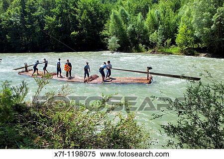Rai or almadia raft La Pobla de Segur Diada dels Raiers ferrymen feast day Noguera Pallaresa river Pyr? n? es Lleida province Catalonia Spain View Large Photo Image Stock Photography - Rai or almadia raft La Pobla de Segur Diada dels Raiers ferrymen feast day Noguera Pallaresa river Pyr? n? es Lleida province Catalonia Spain. Fotosearch