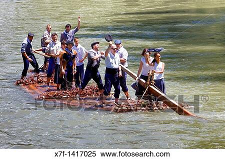 Rai or almadia raft La Pobla de Segur Diada dels Raiers ferrymen feast day Noguera Pallaresa river Pyr? n? es Lleida province Catalonia Spain View Large Photo Image Stock Photography - Rai or almadia raft La Pobla de Segur Diada dels Raiers ferrymen feast day Noguera Pallaresa river Pyr? n? es Lleida province Catalonia Spain. Fotosearch
