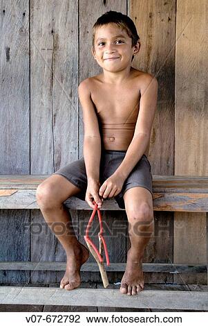 Railan da Silva, lives in one of the isolated comunities in the Amazonas, San Francisco de Asis. Brazil. View Large Photo Image Stock Image - Railan da Silva, lives in one of the isolated comunities in the Amazonas, San Francisco de Asis. Brazil.. Fotosearch