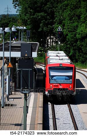 Railcar of the Deutsche Bahn in Memmingen train station View Large Photo Image Stock Image - Railcar of the Deutsche Bahn in Memmingen train station. Fotosearch