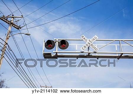 """""Railroad Crossing"""" sign and lights near power lines. "" View Large Photo Image Stock Image - """""Railroad Crossing"""" sign and lights near power lines. "". Fotosearch