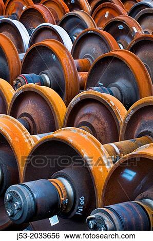 Railroad train wheel and axle assemblies at manufacturing plant, Tacoma, Washington USA. View Large Photo Image Stock Photograph - Railroad train wheel and axle assemblies at manufacturing plant, Tacoma, Washington USA.. Fotosearch