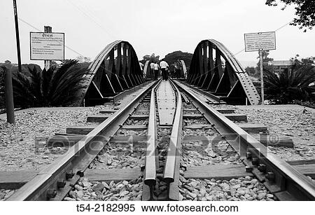 Stock Photography - Railtrack at the River Kwai Bridge in Kanchanaburi. Fotosearch