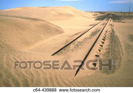 Railway abandoned between Luderitz and Kolmanskop. Namib Desert. Namibia View Large Photo Image Stock Photo - Railway abandoned between Luderitz and Kolmanskop. Namib Desert. Namibia. Fotosearch