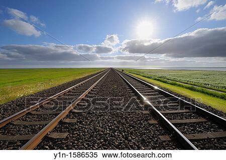 Railway track, Germany, Schleswig Holstein, Sylt, North Frisian Islands, North Sea, View Large Photo Image Stock Photography - Railway track, Germany, Schleswig Holstein, Sylt, North Frisian Islands, North Sea,. Fotosearch