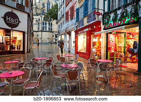 Rain, Christmas shopping, Bayonne, Aquitaine, Pyr? n? es-Atlantiques, Basque country, 64, France. View Large Photo Image Stock Image - Rain, Christmas shopping, Bayonne, Aquitaine, Pyr? n? es-Atlantiques, Basque country, 64, France.. Fotosearch