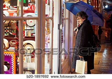 Rain, Christmas shopping, Bayonne, Aquitaine, Pyr? n? es-Atlantiques, Basque country, 64, France. View Large Photo Image Stock Image - Rain, Christmas shopping, Bayonne, Aquitaine, Pyr? n? es-Atlantiques, Basque country, 64, France.. Fotosearch