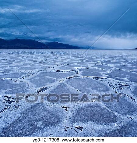 Rain clouds over Badwater basin, Death Valley national park, California View Large Photo Image Stock Photo - Rain clouds over Badwater basin, Death Valley national park, California. Fotosearch