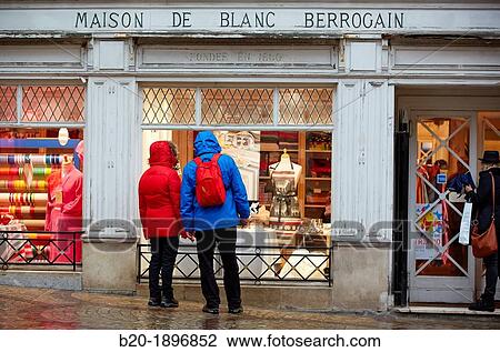 Stock Image - Rain, Shopping, Bayonne, Aquitaine, Pyr? n? es-Atlantiques, Basque country, 64, France.. Fotosearch