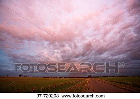 Stock Photo - Rain storm early morning over Corack, Wimmera district Victoria, Australia. Fotosearch