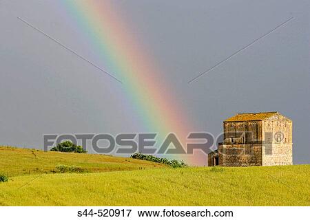 Rainbow and field. Sevilla province, Andalusia, Spain View Large Photo Image Stock Photo - Rainbow and field. Sevilla province, Andalusia, Spain. Fotosearch